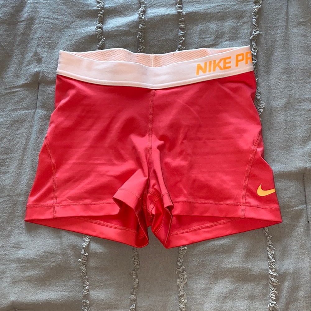 Woman’s Bright Orangeish Pink Spandex Size S